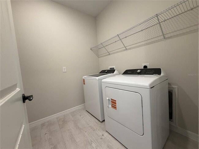 Building Photo - 5648 Flame Vine Wy