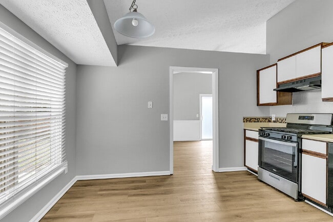 Building Photo - Location, Space and convenience at this adorable home.