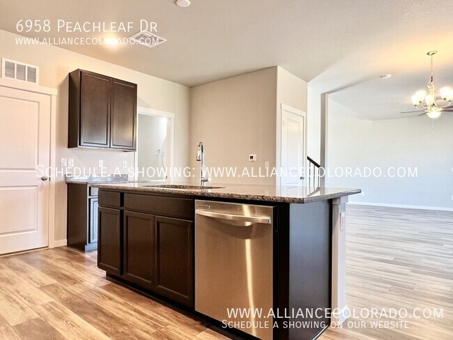 Building Photo - 6958 Peachleaf Dr