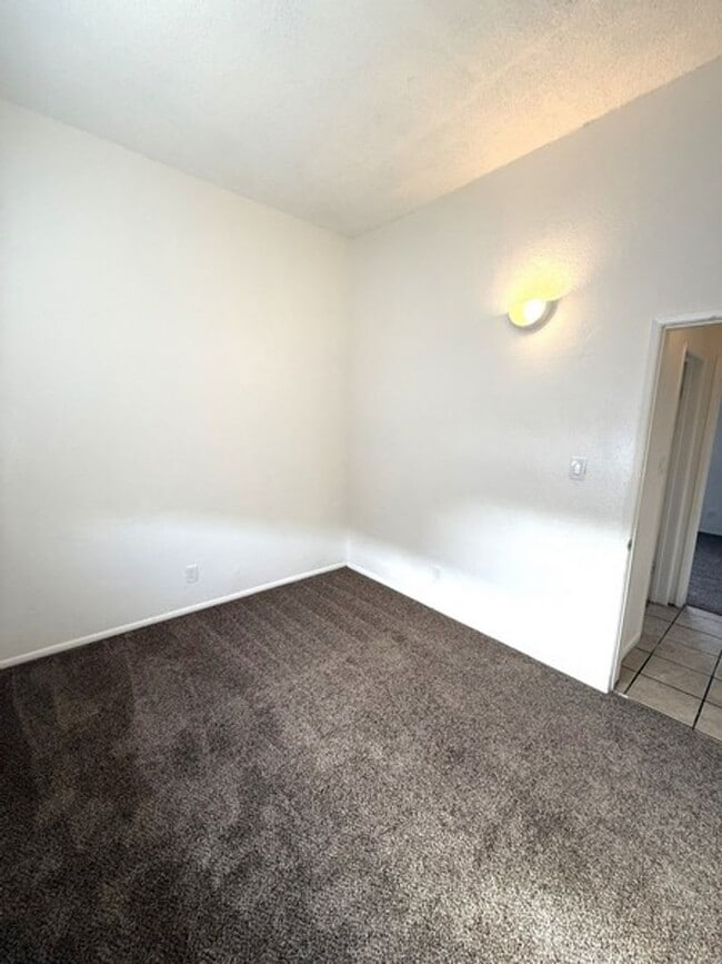 Building Photo - Completely renovated 3 bedroom apartment with a patio