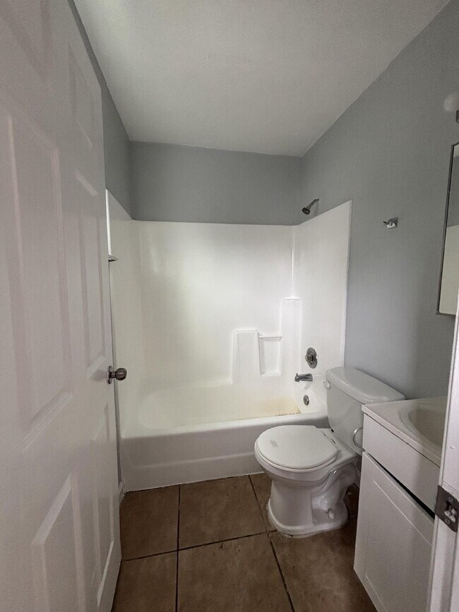 Building Photo - Corner & 1st Floor - Location, location, location! Become the newest neighbor at Palm Garden Apar...