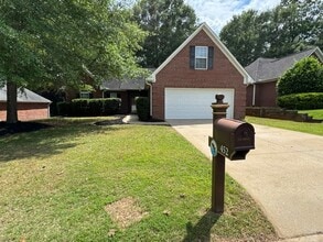 Building Photo - This 1.5  story, all brick, 3 bedroom, 2 bath, Bonus room upstairs & a 2 car garage with great st...