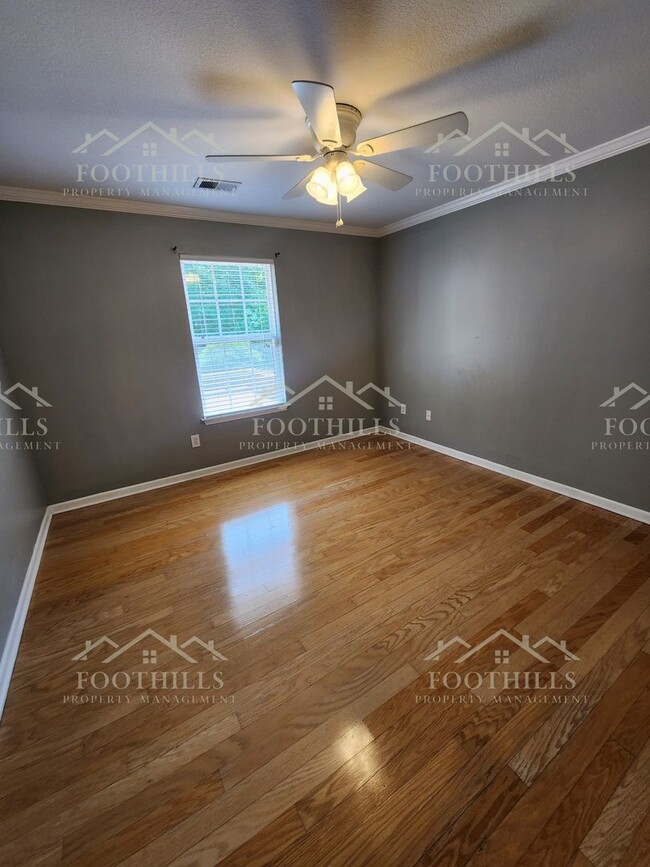 Building Photo - Beautiful 3-Bedroom Brick Home with Sunroo...