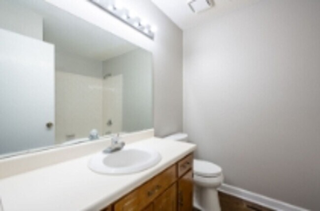 Building Photo - This beautifully updated brick home in Har...
