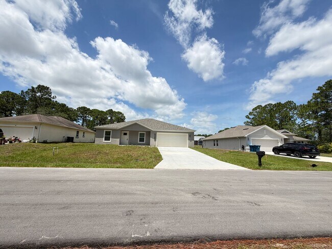 Building Photo - Brand-New 4BR Palm Bay Retreat Designed for Modern Living! NEW BUILD HOME!