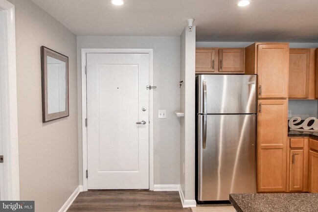 Building Photo - Bright 1BR with Parking Included, Minutes from The Wharf!