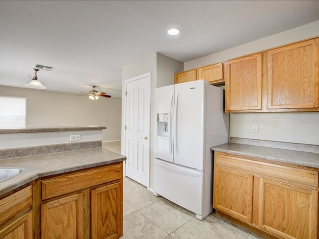 Building Photo - Spacious Two-Story 4 Bedroom with Upstairs Family Room & Large Encolsed Backyard!