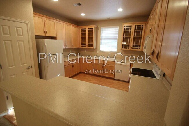 Building Photo - 6385 S Xanadu Way