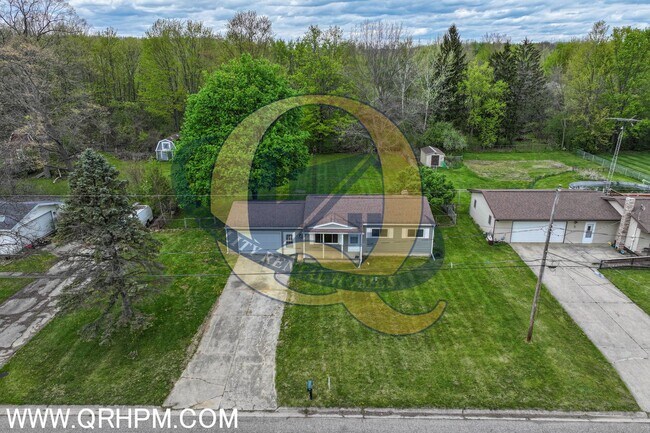 Building Photo - Available Now! Genesee Township!