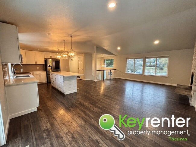 Building Photo - Shared Split level 3 Bed 2 Bath Upstairs Unit with Modern Upgrades Close to JBLM!