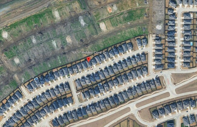 Building Photo - 16617 Hidden Cove Dr