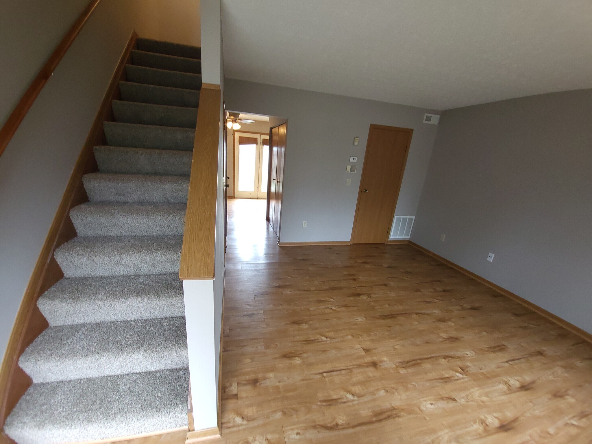 View from front door leading to living room, to kitchen and dining, then to patio/backyard/garage - 364 E Mithoff St