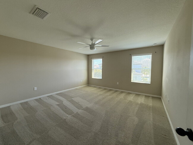 Building Photo - Spacious 4-Bedroom Retreat with additional office/den in the Heart of Trinity!