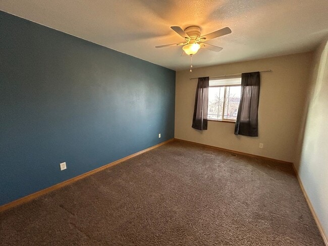 Building Photo - Spacious 5-Bedroom Home with Finished Basement and 3-Car Garage in Wellington