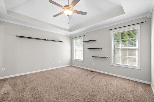 Building Photo - Pet Friendly Three Bedroom with Bonus!