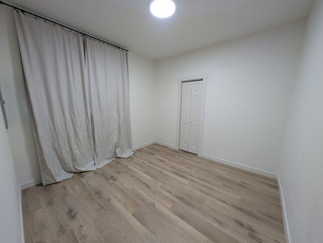 Building Photo - Adorable Four Bedroom w/ Fenced Yard Avail...
