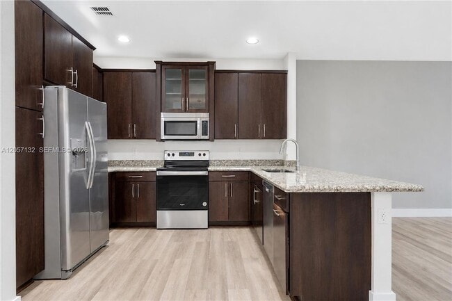Building Photo - 13005 Riverwalk Cir N