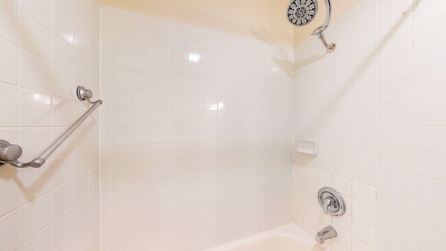 Building Photo - 2 story 2 bedroom 1 bath condo with covered parking, private storage and community pool!