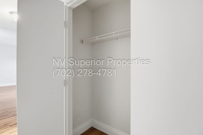 Building Photo - SW!!! 2 Bedroom Condo 1st Floor!! 2 Garage!! Gated!! Community Pool!! Fitness Room!! 2 Primary Be...