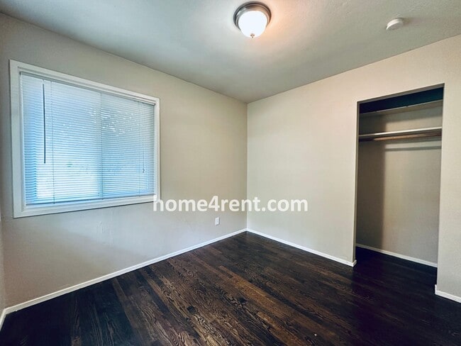 Building Photo - Attractive Prairie Village Ranch w/ FRESH PAINT, Wood Floors, Granite Counters and a Fenced Yard!