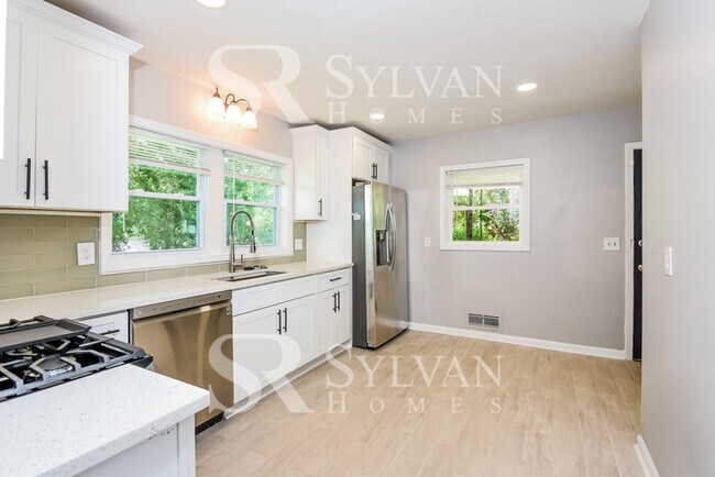 Building Photo - Turn the key. Enter. Smile. Repeat every day!