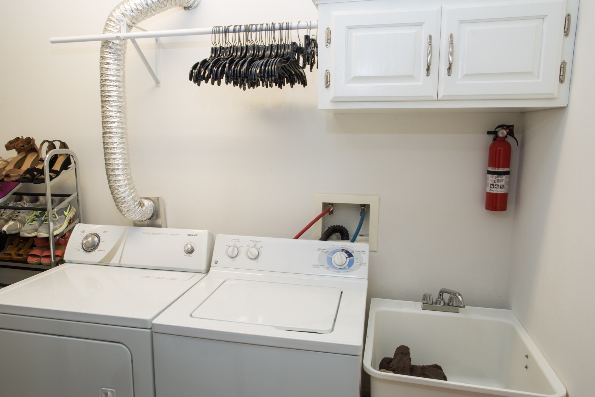 Attached laundry room w/ utility tub. - 2010 E Iron St