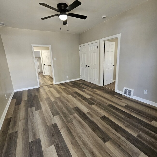 Building Photo - Duplex - 2 Bedroom Completely Remodeled Living Space with New Laminate Flooring on Main Floor alo...