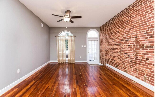Building Photo - Charming 2bdrm 2.5 bath Patterson Park home with parking and rooftop deck