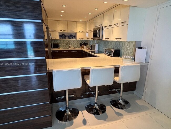 Building Photo - 9511 Collins Ave