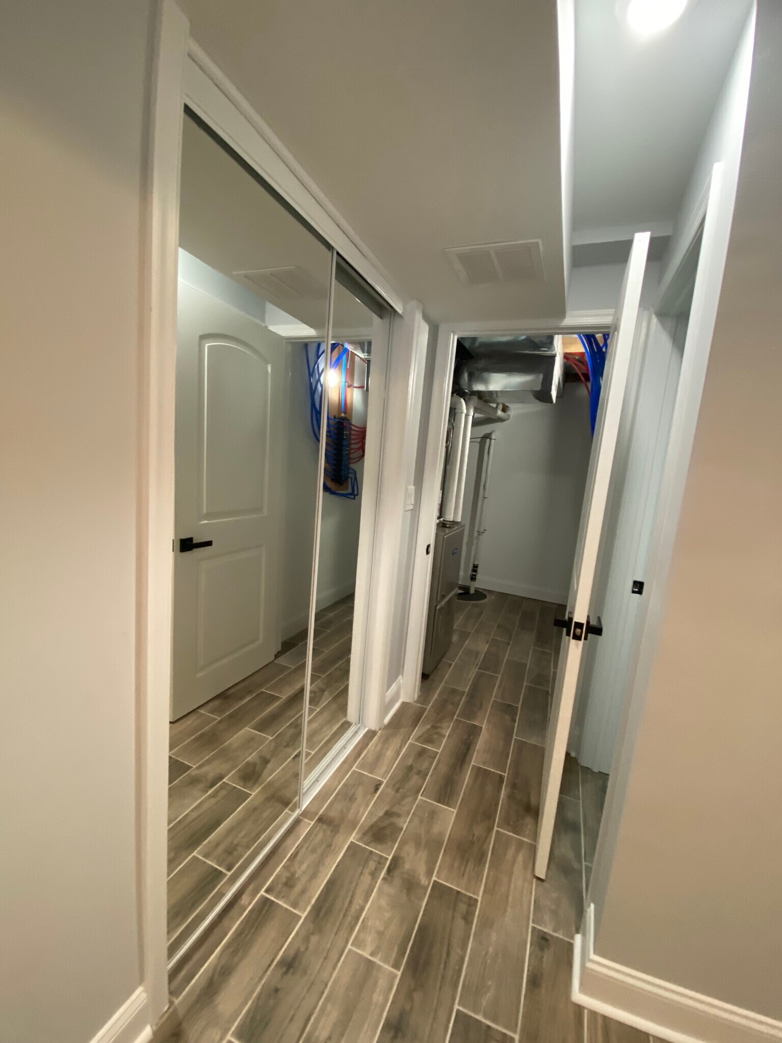 Basement utility room sliding closet - 1525 Manton St