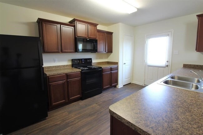 Building Photo - 8202 Sandy Sea Rd