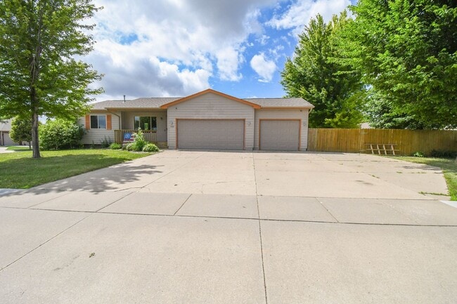 Building Photo - Spacious Ranch Home with 3-Car Garage, Finished Basement & Fenced Yard!