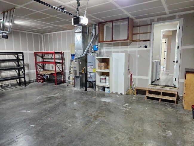 Building Photo - Spacious Tacoma Home with Gas Fireplace, 3-Car Garage & Covered Patio!
