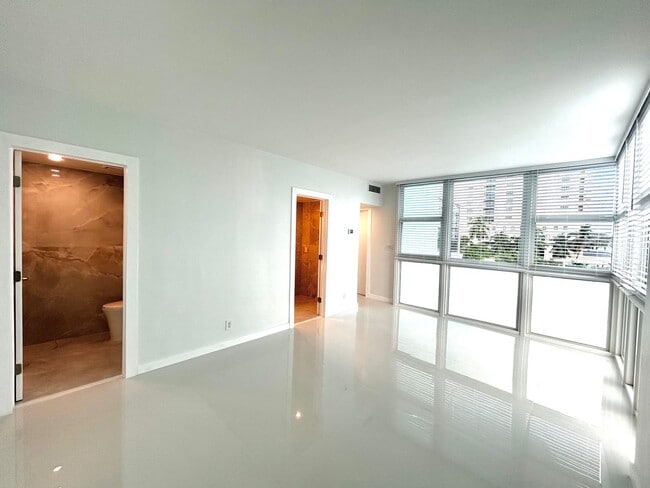 Building Photo - Fully Renovated East-Facing 2BR/2BA + Bonus Room | Ocean Views | In-Unit W/D