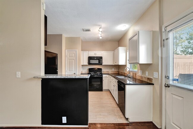 Building Photo - 23624 Wildwood Green Way