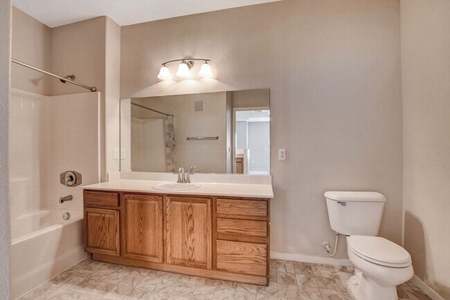 Building Photo - FIRST FLOOR CONDO IN GATED COMMUNITY W/ SINGLE CAR GARAGE