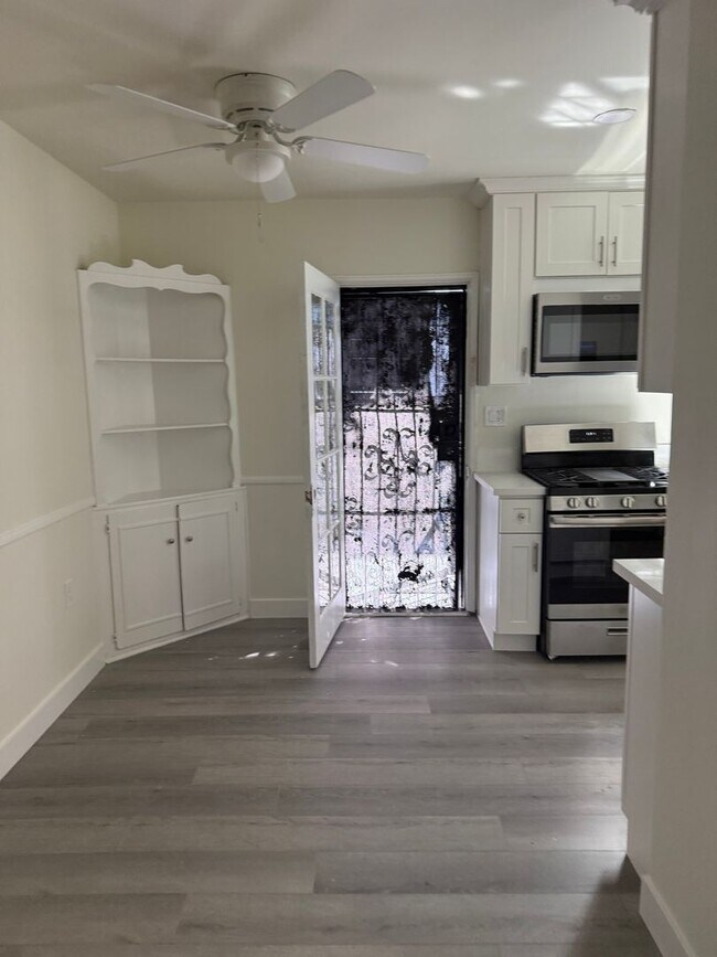 Building Photo - FOR RENT — COMPLETELY REMODELED Apartment