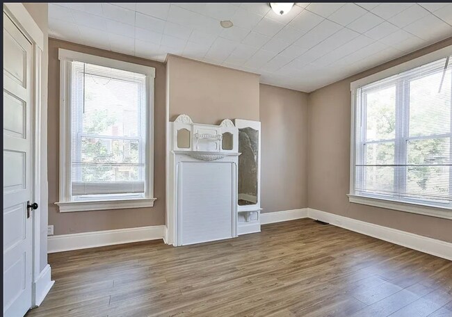 Building Photo - Bright 4-Bed Home with Fenced Yard, Central HVAC, and 3 Finished Levels