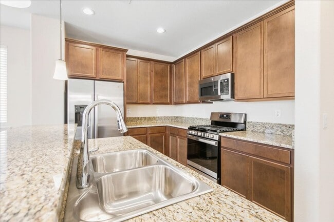 Building Photo - The Tahoe - Luxury 3 Bedroom, 2.5 Bath Townhome with Full 2 Car Garage