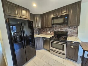 Building Photo - Discover stunning city views from your bedroom