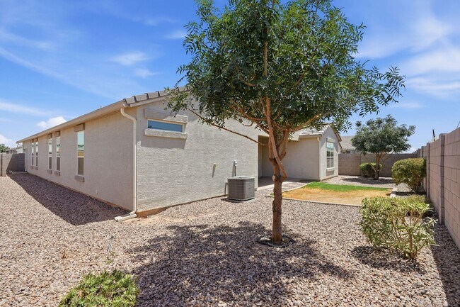 Building Photo - Spacious 5-Bedroom Home with Open Floor Plan & Private Backyard