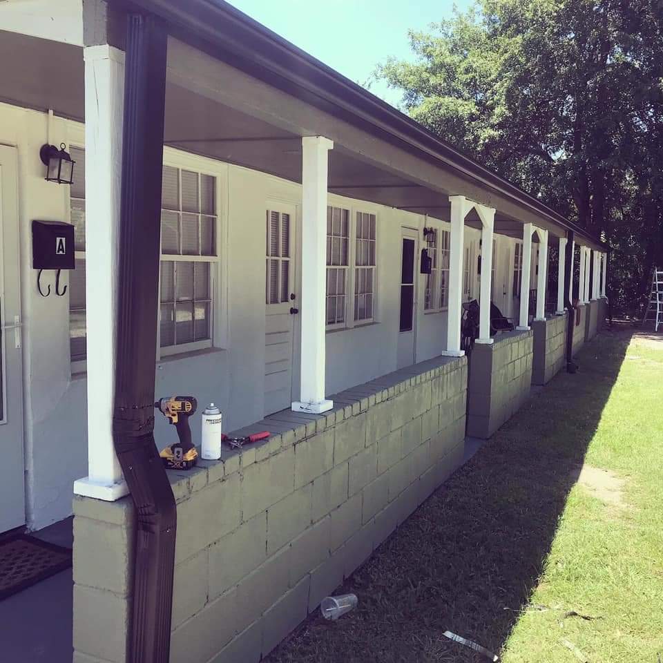 Covered porch Area in front of units perfect for enjoying a cup of tea in the morning. - 105 Smith Ave