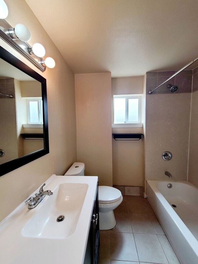 Building Photo - Totally remodeled. Impressive, open floor ...