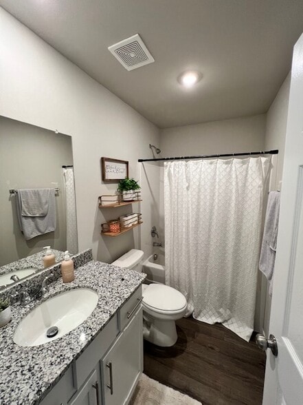Second bath has shower/tub, granite countertop - 2488 N Raven Ln
