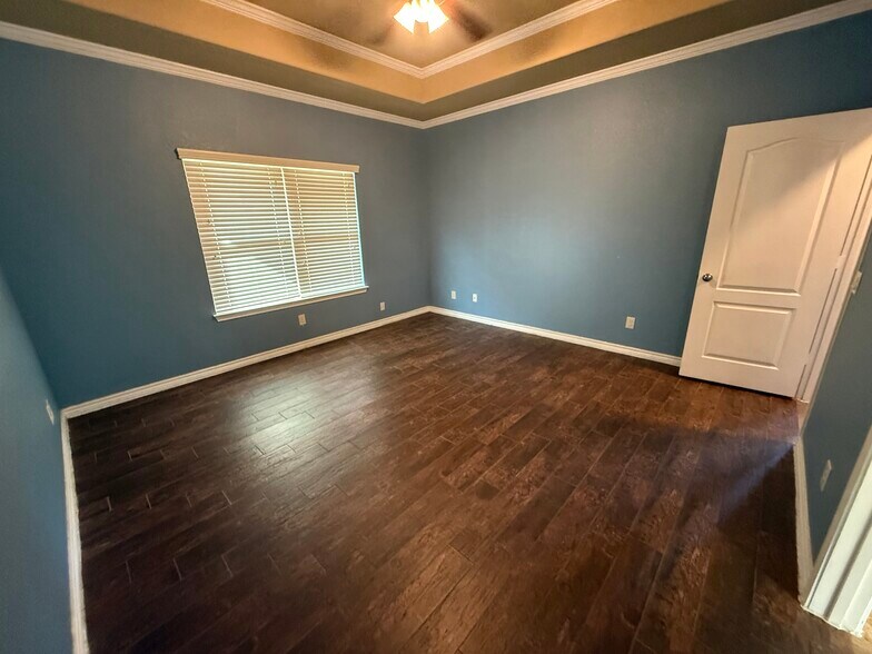 Bedroom #1 This is the Downstairs Large Bedroom Suite with Ceramic Tile with Woodlike feel. - 420 Slippery Rock