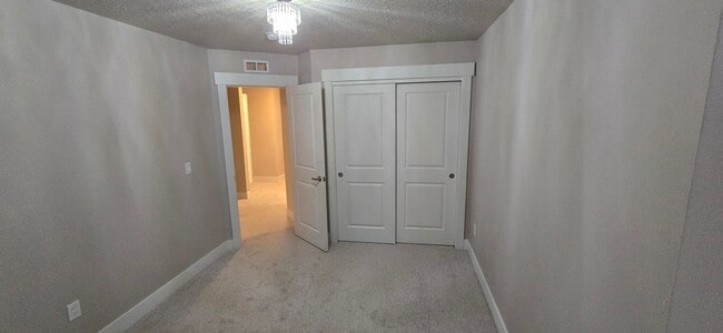 Building Photo - Come check out this beautiful 3 story town...