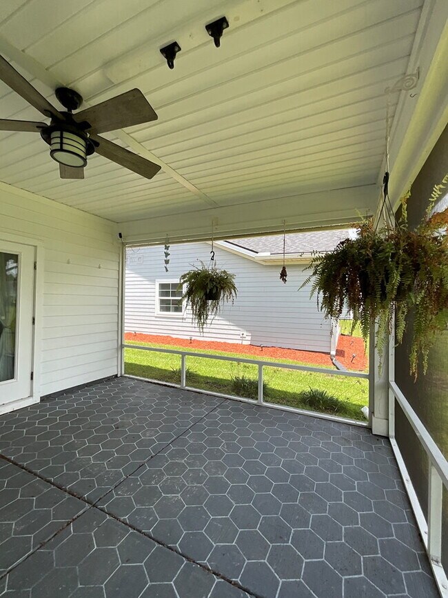 Building Photo - "Spacious 4-Bed Oasis with Stunning Lake V...