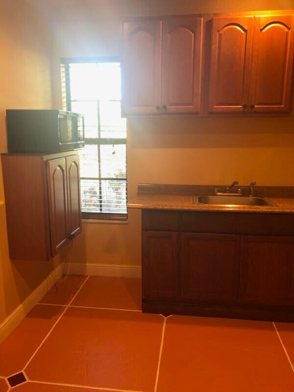 Building Photo - 6425 Royal Palm Beach Blvd