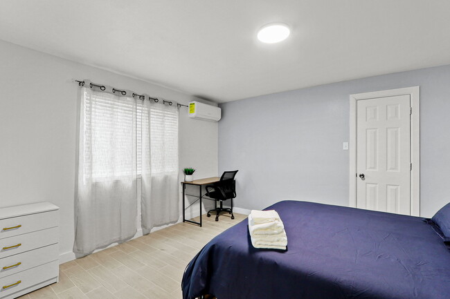 Bedroom with Work Desk - 5200 Carousel Dr