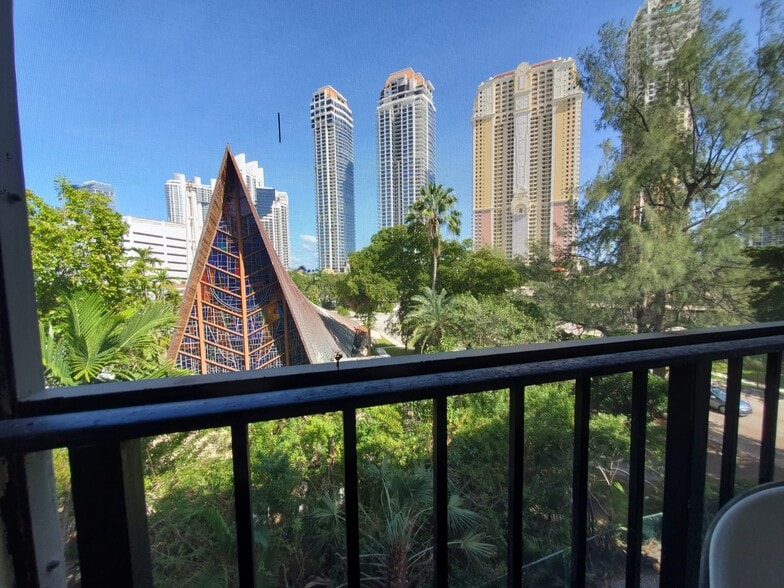 Balcony view from balcony with full net - 201 178th Dr